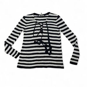 Black and gray striped sweater with lace up detail